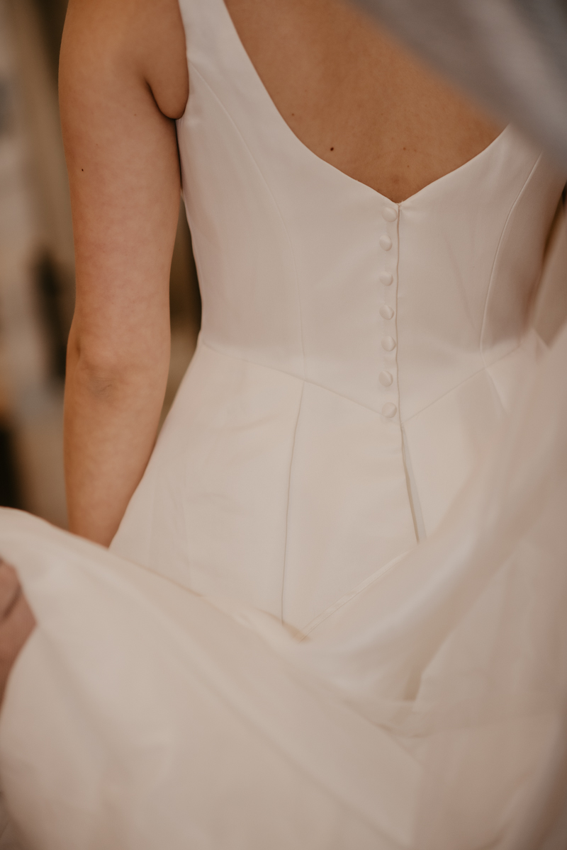 A bride getting ready for her wedding at Kylan Barn in Delmar, Maryland by Britney Clause Photography