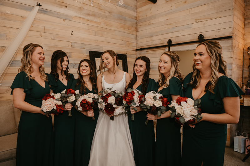 A bride getting ready for her wedding at Kylan Barn in Delmar, Maryland by Britney Clause Photography