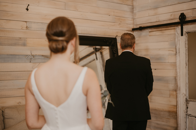 A bride getting ready for her wedding at Kylan Barn in Delmar, Maryland by Britney Clause Photography