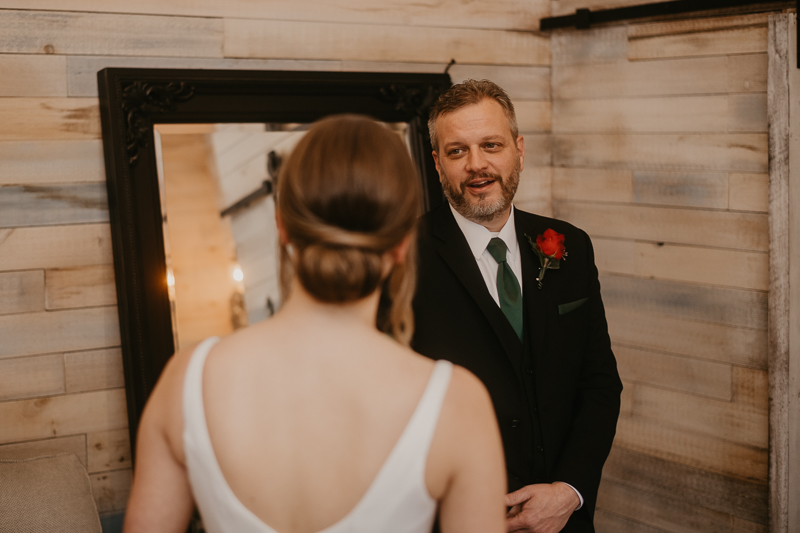 A bride getting ready for her wedding at Kylan Barn in Delmar, Maryland by Britney Clause Photography