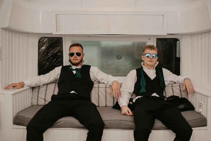 A groom getting ready for his wedding at Kylan Barn in Delmar, Maryland by Britney Clause Photography