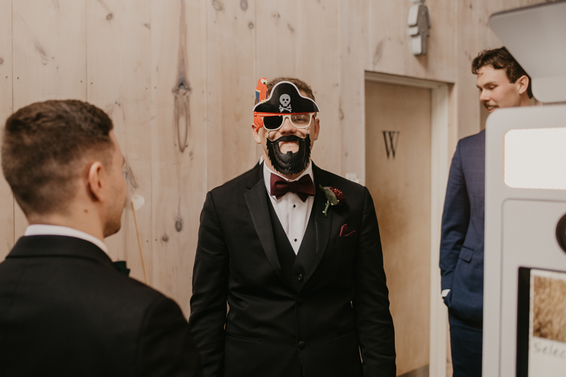 A groom getting ready for his wedding at Kylan Barn in Delmar, Maryland by Britney Clause Photography