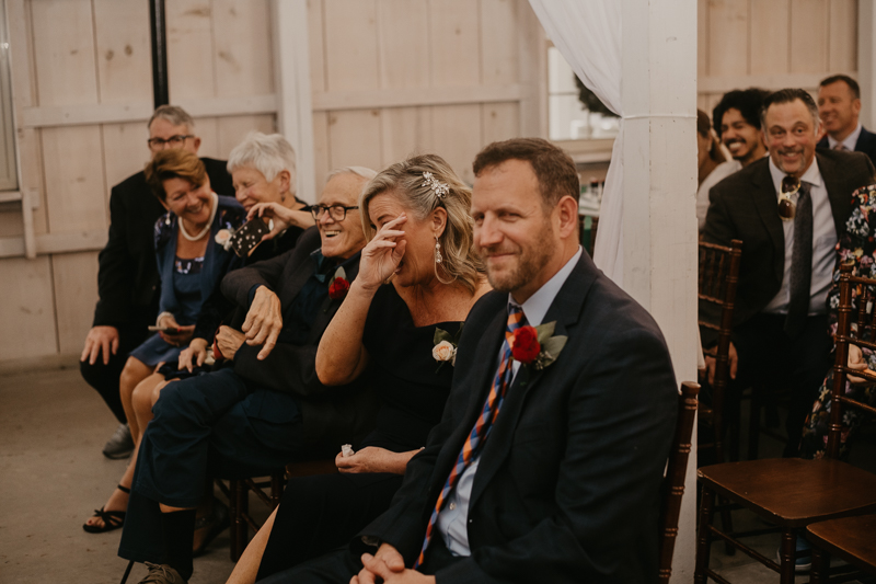 Amazing indoor wedding ceremony at Kylan Barn in Delmar, Maryland by Britney Clause Photography