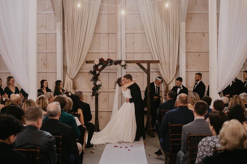 Amazing indoor wedding ceremony at Kylan Barn in Delmar, Maryland by Britney Clause Photography
