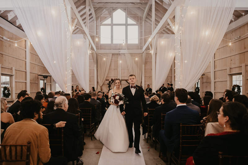 Amazing indoor wedding ceremony at Kylan Barn in Delmar, Maryland by Britney Clause Photography