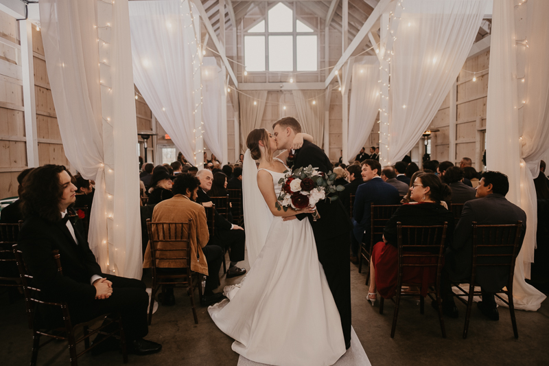 Amazing indoor wedding ceremony at Kylan Barn in Delmar, Maryland by Britney Clause Photography