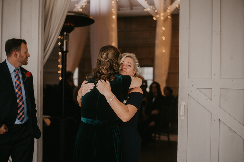 Amazing indoor wedding ceremony at Kylan Barn in Delmar, Maryland by Britney Clause Photography