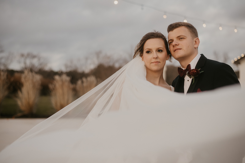 Stunning bride and groom sunset wedding portraits at Kylan Barn in Delmar, Maryland by Britney Clause Photography