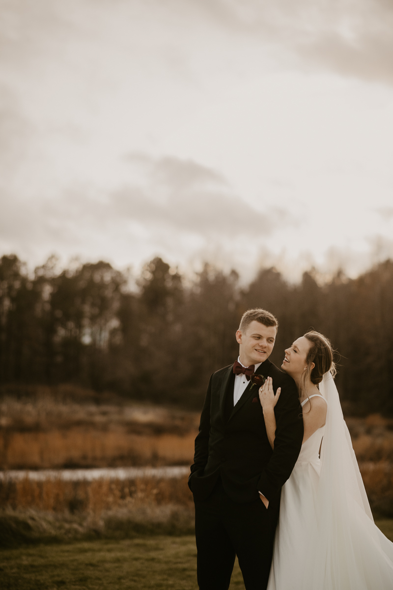 Stunning bride and groom sunset wedding portraits at Kylan Barn in Delmar, Maryland by Britney Clause Photography