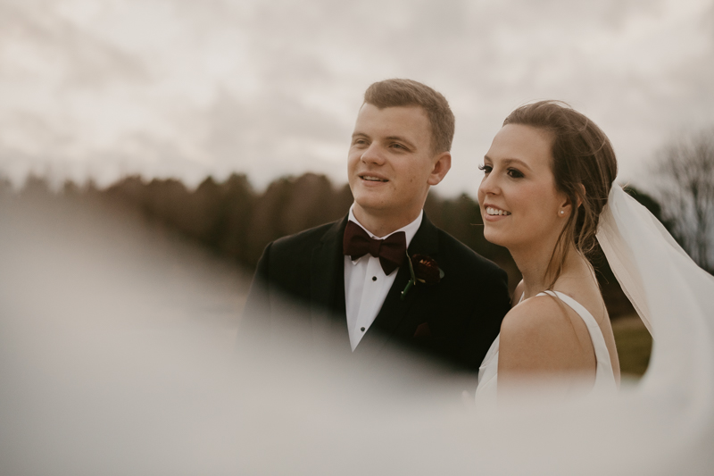 Stunning bride and groom sunset wedding portraits at Kylan Barn in Delmar, Maryland by Britney Clause Photography