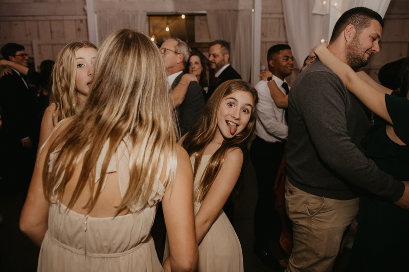 A fun wedding reception at Kylan Barn in Delmar, Maryland by Britney Clause Photography