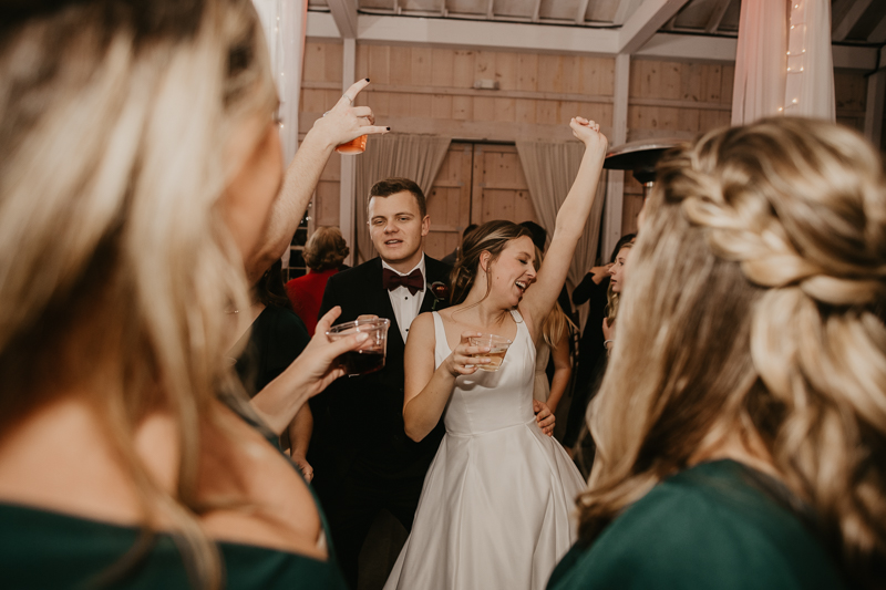 A fun wedding reception at Kylan Barn in Delmar, Maryland by Britney Clause Photography