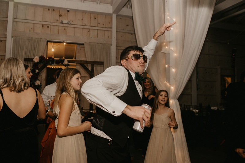 A fun wedding reception at Kylan Barn in Delmar, Maryland by Britney Clause Photography