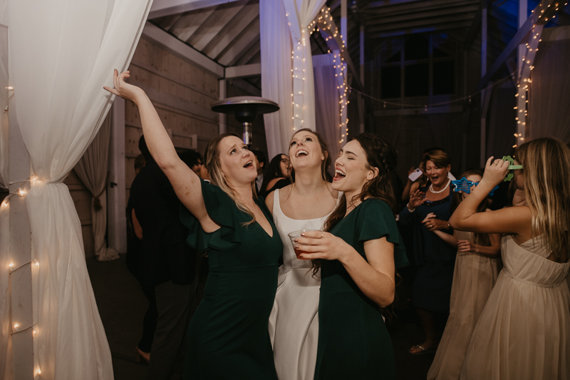 A fun wedding reception at Kylan Barn in Delmar, Maryland by Britney Clause Photography