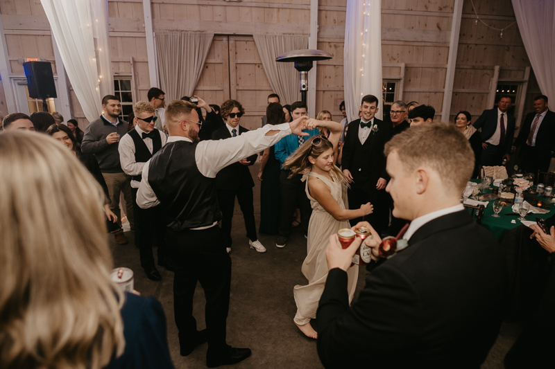 A fun wedding reception at Kylan Barn in Delmar, Maryland by Britney Clause Photography