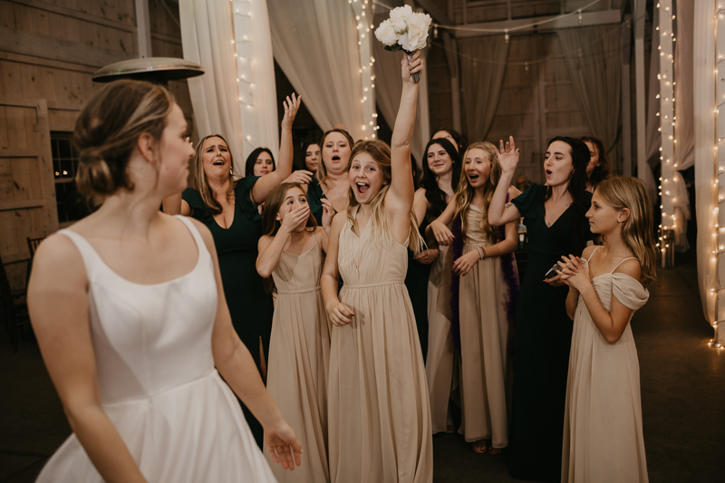 A fun wedding reception at Kylan Barn in Delmar, Maryland by Britney Clause Photography