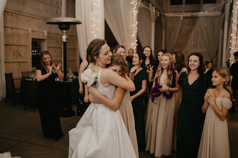 A fun wedding reception at Kylan Barn in Delmar, Maryland by Britney Clause Photography