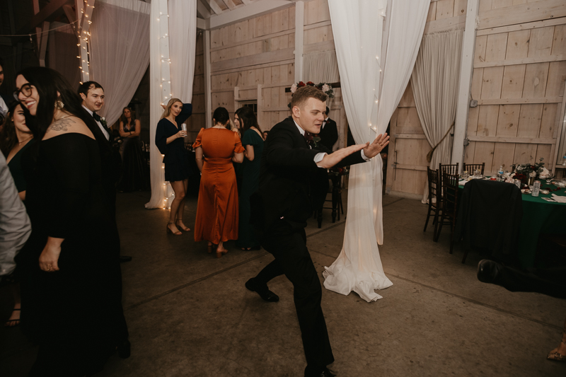 A fun wedding reception at Kylan Barn in Delmar, Maryland by Britney Clause Photography