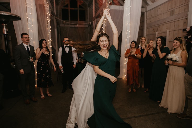 A fun wedding reception at Kylan Barn in Delmar, Maryland by Britney Clause Photography