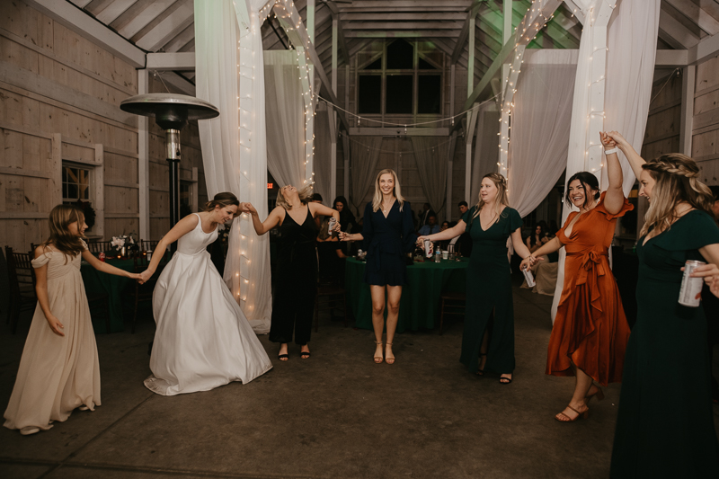 A fun wedding reception at Kylan Barn in Delmar, Maryland by Britney Clause Photography