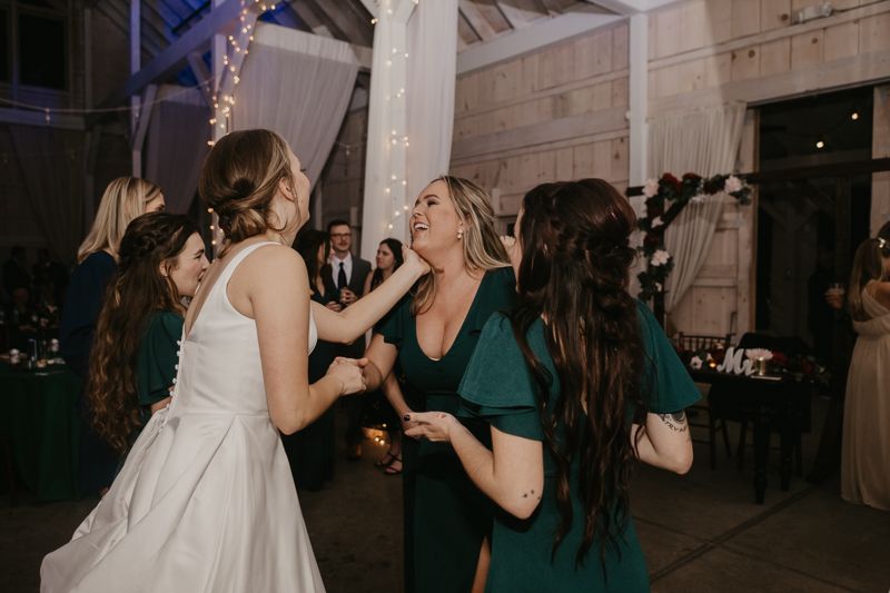 A fun wedding reception at Kylan Barn in Delmar, Maryland by Britney Clause Photography