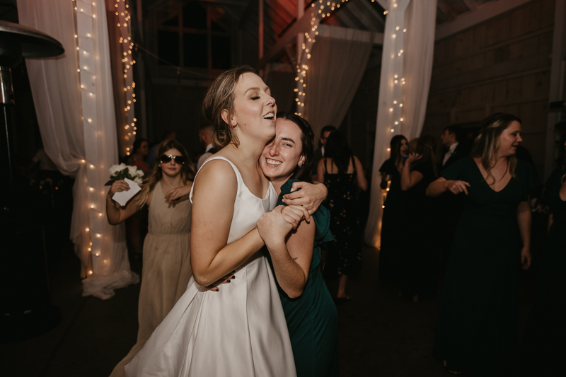 A fun wedding reception at Kylan Barn in Delmar, Maryland by Britney Clause Photography