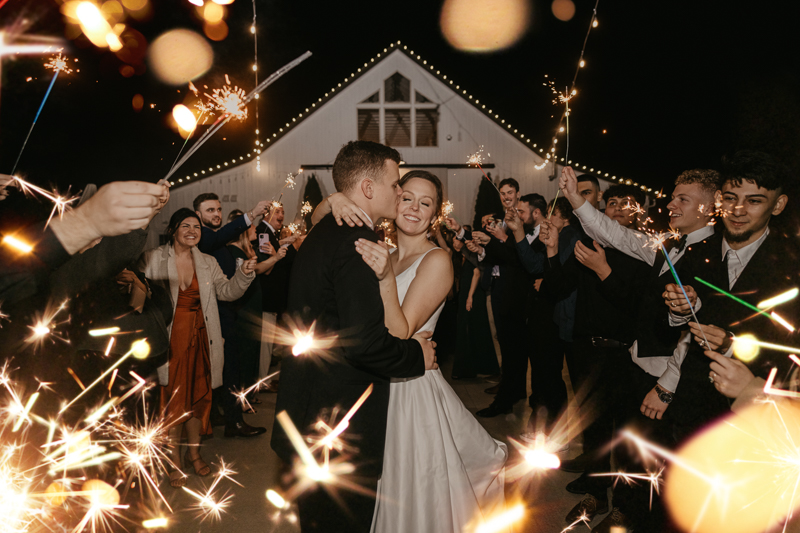 A fun wedding reception at Kylan Barn in Delmar, Maryland by Britney Clause Photography