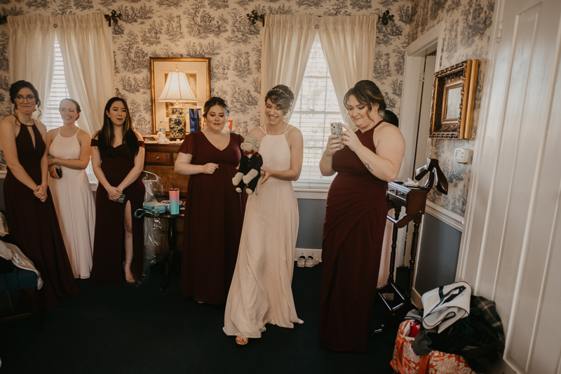 A bride getting ready for her wedding at Antrim 1844 in Taneytown, Maryland by Britney Clause Photography