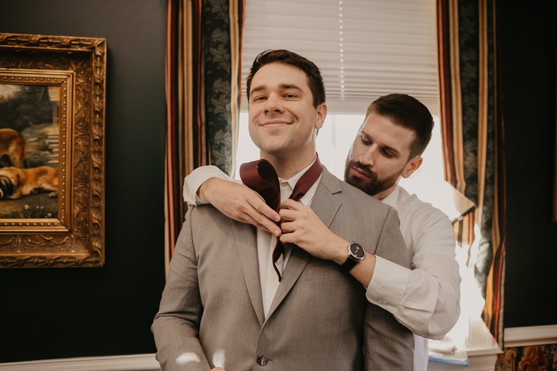 A groom getting ready for his wedding at Antrim 1844 in Taneytown,Maryland by Britney Clause Photography