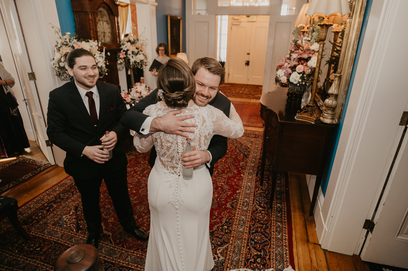 A fun first look where the bride ices the groomsmen at Antrim 1844 in Taneytown, Maryland by Britney Clause Photography