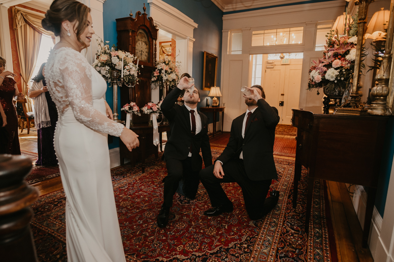 A fun first look where the bride ices the groomsmen at Antrim 1844 in Taneytown, Maryland by Britney Clause Photography