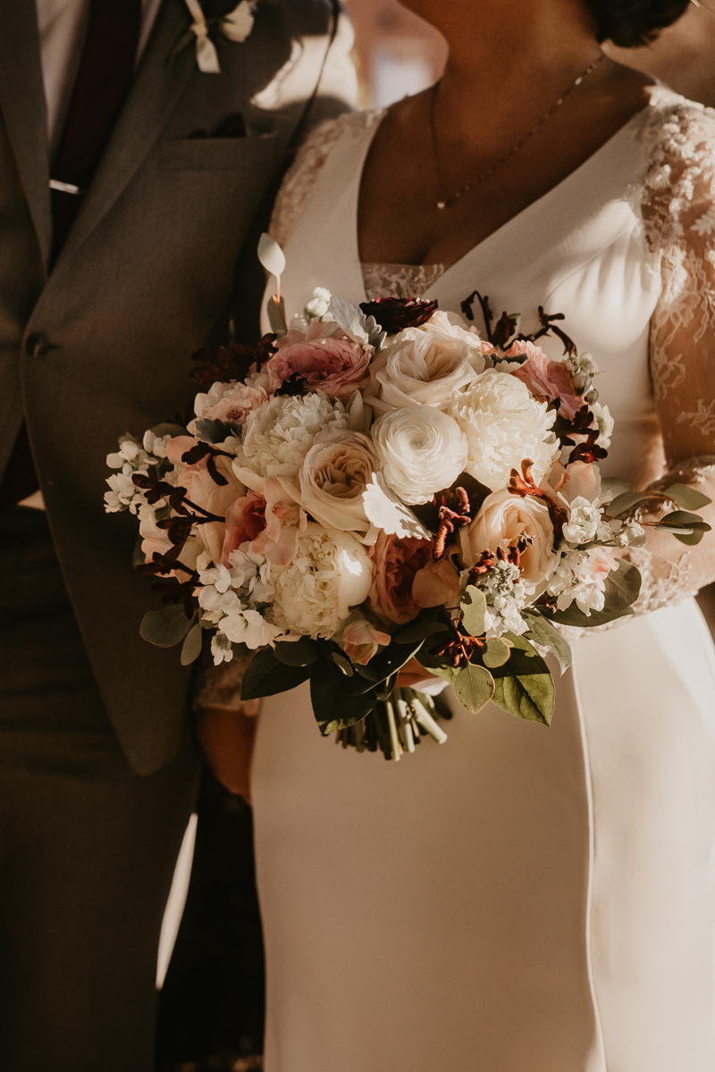 Stunning wedding day florals by Shelia Smith at Antrim 1844 in Taneytown, Maryland by Britney Clause Photography