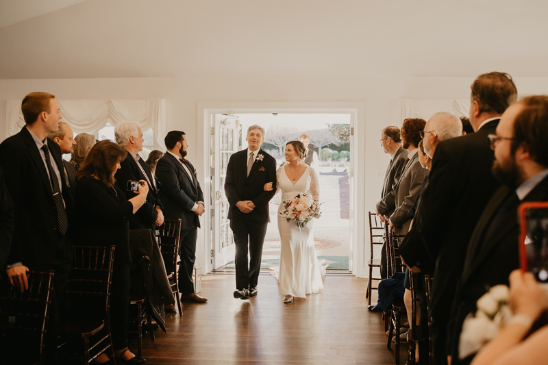 A gorgeous indoor wedding ceremony at Antrim 1844's Garden Room in the Pavilion in Taneytown, Maryland by Britney Clause Photography