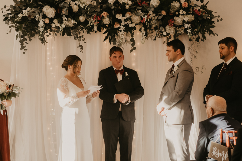 A gorgeous indoor wedding ceremony at Antrim 1844's Garden Room in the Pavilion in Taneytown, Maryland by Britney Clause Photography