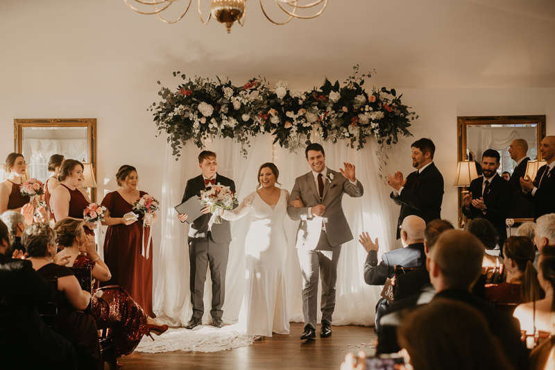 A gorgeous indoor wedding ceremony at Antrim 1844's Garden Room in the Pavilion in Taneytown, Maryland by Britney Clause Photography