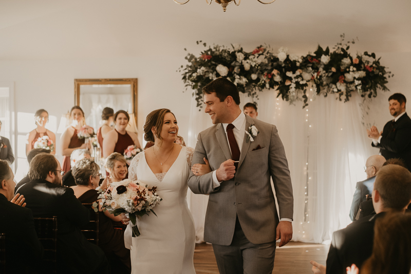 A gorgeous indoor wedding ceremony at Antrim 1844's Garden Room in the Pavilion in Taneytown, Maryland by Britney Clause Photography