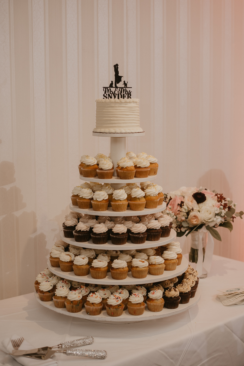 A tasty cupcake tower by Midnight Confections Cupcakery at Antrim 1844 in Taneytown, Maryland by Britney Clause Photography