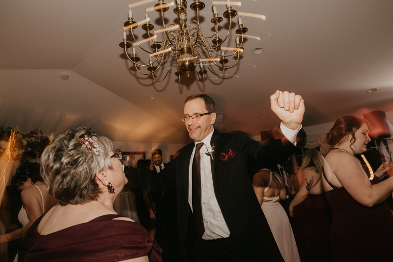 A lively wedding dance floor by Dance Masters Entertainment at Antrim 1844 in Taneytown, Maryland by Britney Clause Photography